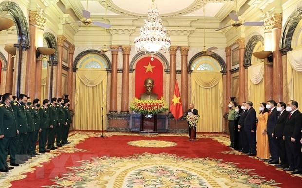 Chủ tịch nước Nguyễn Xuân Phúc phát biểu tại buổi trao quyết định. (Ảnh: Thống Nhất/TTXVN).