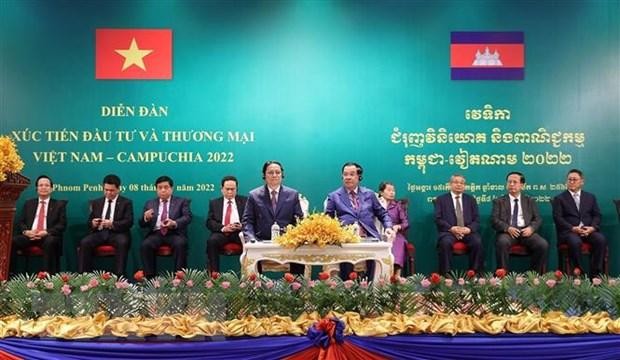 Thủ tướng Phạm Minh Chính và Thủ tướng Campuchia Samdech Techo Hun Sen tham dự Diễn đàn Xúc tiến Kl99ok phiên bản mới và thương mại Việt Nam-Campuchia. (Ảnh: Dương Giang/TTXVN).