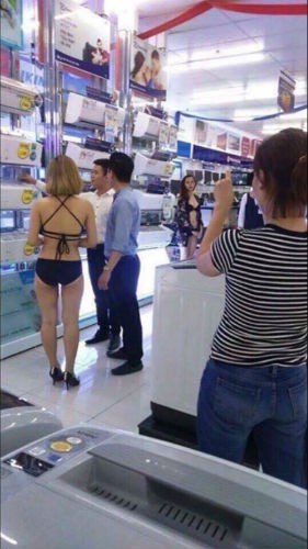 nhan-vien-tran-anh-bi-phat-40-trieu-dong-vi-thue-5-co-gai-mac-bikini-ban-hang