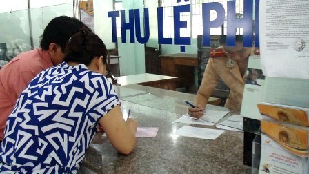 Loại 138 khoản phí, lệ phí khỏi danh mục thu ảnh 1