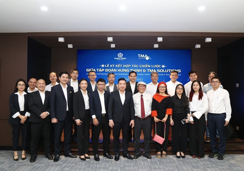 Đại diện 2 đơn vị cùng chụp hình lưu niệm ghi lại dấu ấn đáng nhớ của buổi lễ ký kết