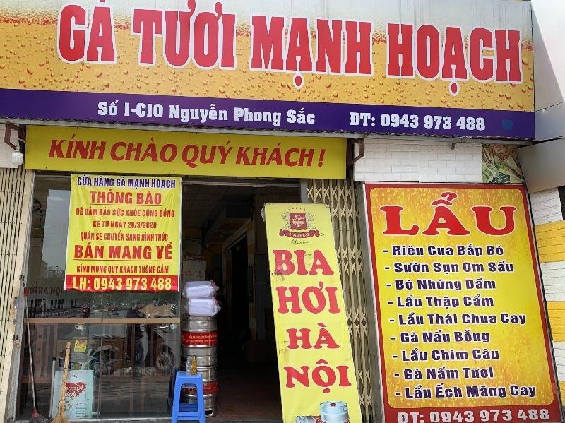 Cửa hàng ăn tại Nguyễn Phong Sắc- Cầu Giấy cũng đã chấp hành nghiêm chỉnh quy định phòng, chống dịch COVID-19. (Ảnh: Phương Linh)