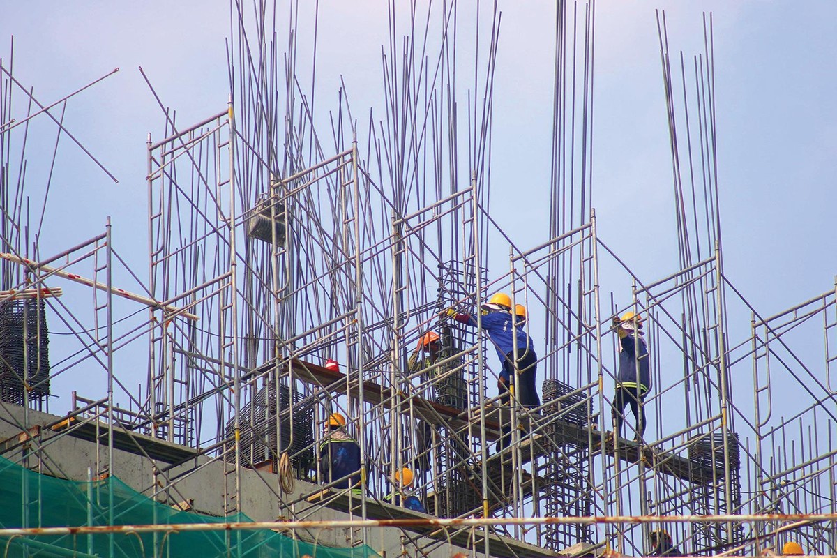 Dịch bệnh không làm ảnh hưởng đến tiến độ thi công các dự án. Ảnh: Lê Toàn Dịch bệnh không làm ảnh hưởng đến tiến độ thi công các dự án. Ảnh: Lê Toàn