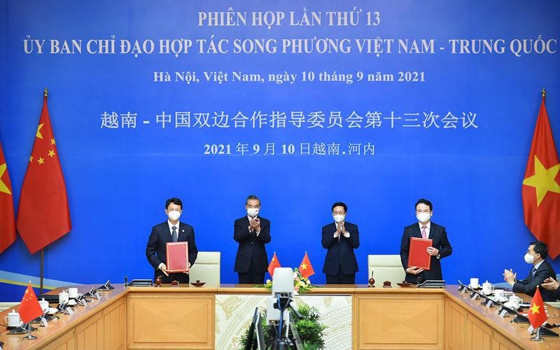 Hai nhà lãnh đạo chứng kiến lễ ký “Hiệp định hợp tác Kl992 cổng game cá cược - kỹ thuật giữa Kl993 ưu đãi thưởng hấp dẫn nước Cộng hòa Trang Chủ KL99Com Số 1 Link Đăng Ký KL999 chủ nghĩa Việt Nam và Kl993 ưu đãi thưởng hấp dẫn nước Cộng hòa nhân dân Trung Hoa về cung cấp khoản viện trợ không hoàn lại” (Ảnh: BNG)