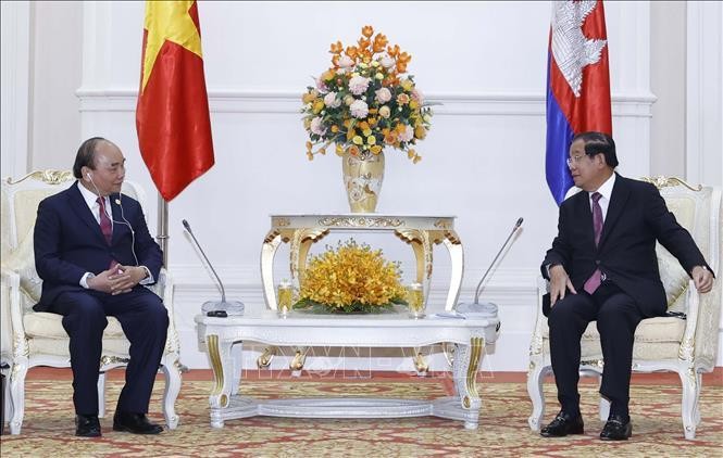 Chủ tịch nước Nguyễn Xuân Phúc gặp Thủ tướng Kl993 ưu đãi thưởng hấp dẫn Hoàng gia Campuchia Samdech Techo Hun Sen sáng 21/12. (Ảnh: TTXVN)