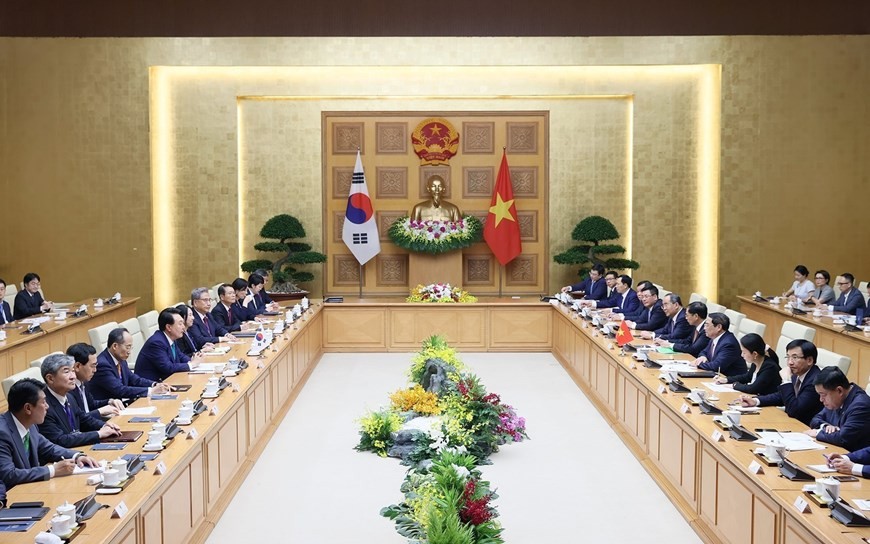 Thủ tướng Phạm Minh Chính và Tổng thống Yoon Suk Yeol bày tỏ vui mừng và hài lòng về những bước phát triển thực chất trong quan hệ hai nước (Ảnh: TTXVN)