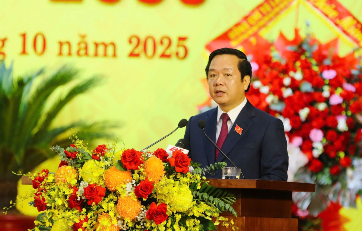 Phó bí thư Tỉnh ủy, Chủ tịch UBND tỉnh Phạm Quang Ngọc trình bày Báo cáo Kl991.com tải ứng dụng tại Đại hội.