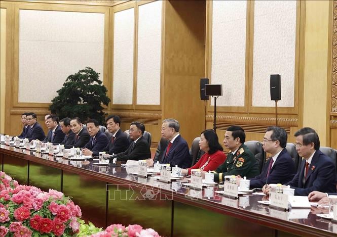 Tổng Bí thư, Chủ tịch nước Tô Lâm và thành viên Đoàn cấp cao Việt Nam tại cuộc hội đàm với Tổng Bí thư, Chủ tịch nước Trung Quốc Tập Cận Bình và Đoàn cấp cao Trung Quốc. Ảnh: Thống Nhất/TTXVN