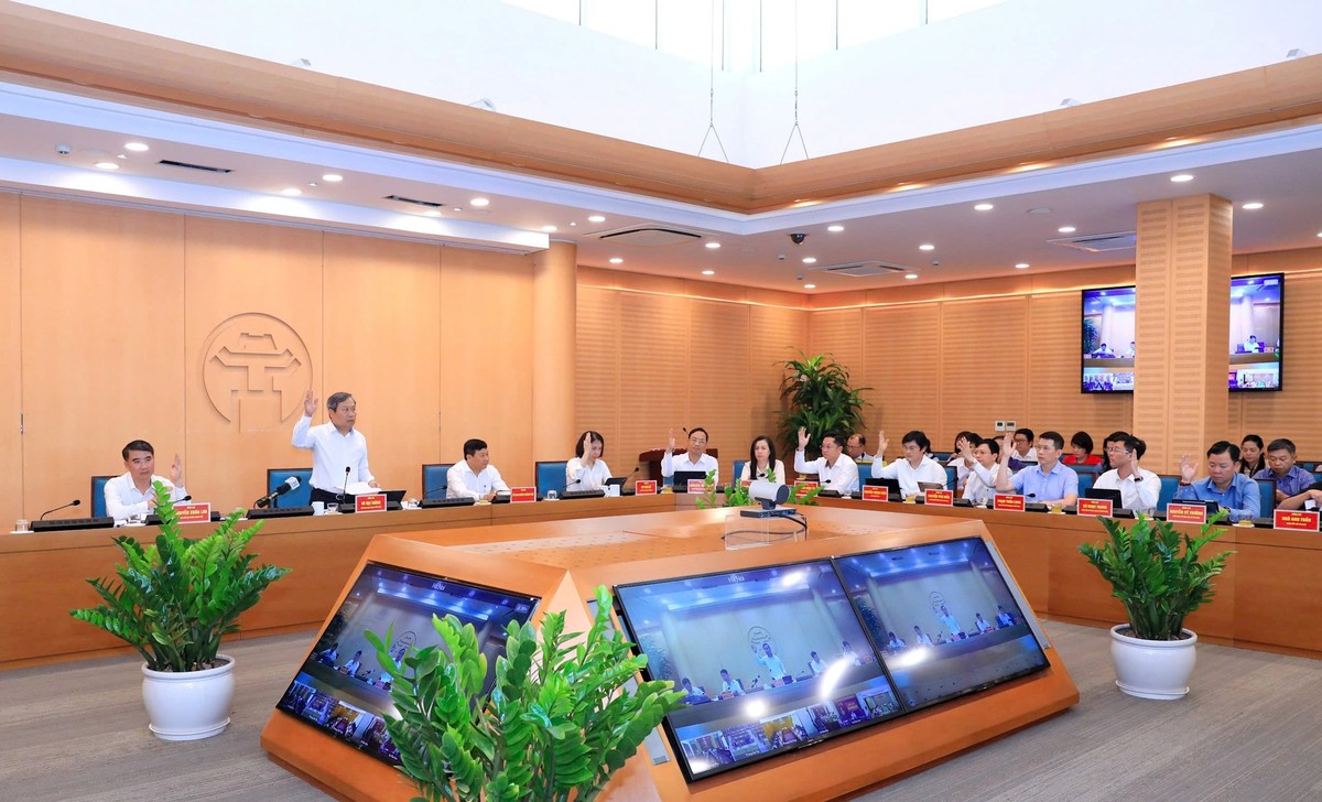 Tập thể UBND TP. Hà Nội biểu quyết thống nhất thông qua các nội dung theo Chương trình.