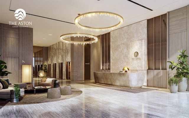 Thiết kế sang trọng cùng tông màu nâu ấm, sảnh đón tiếp tại The Aston Luxury Residence mang lời chào nồng ấm tới gia chủ mỗi khi về nhà.