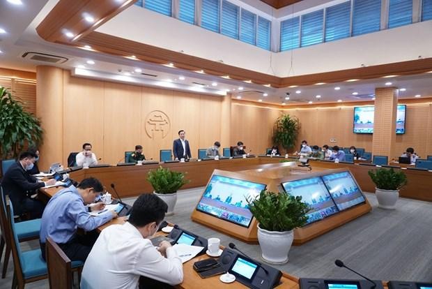 Cuộc họp của Ban Chỉ đạo phòng, chống dịch COVID-19 thành phố Hà Nội. (Ảnh: PV/Vietnam+).