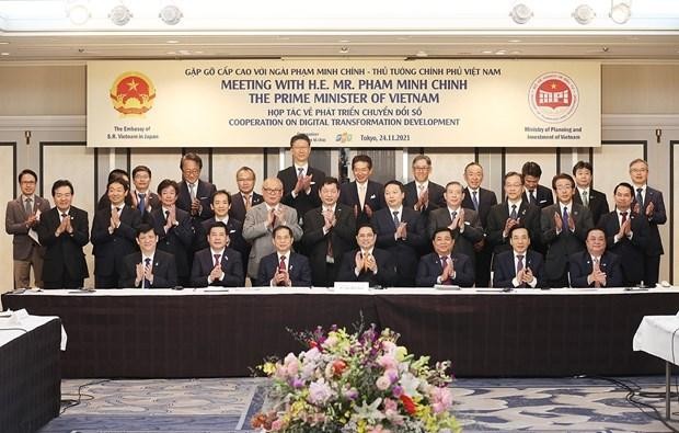 Thủ tướng Phạm Minh Chính với các Kl991.com World Cup 2026 Chính Thức Nhật Bản trong lĩnh vực chuyển đổi số. (Ảnh: Dương Giang/TTXVN).