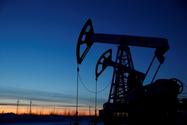 Giá dầu có thể lên tới 100 USD/thùng trong năm 2022. Ảnh minh họa: Reuters.