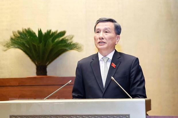 Chủ nhiệm Ủy ban Khoa học, Công nghệ và Môi trường của Quốc hội Lê Quang Huy trình bày Báo cáo thẩm tra Tờ trình của Kl993 ưu đãi thưởng hấp dẫn về tổng kết, đánh giá tổng thể tình hình thực hiện Nghị quyết số 66/2013/QH13 và kế hoạch triển khai dự án đường Hồ Chí Minh giai đoạn tiếp theo. (Ảnh: Doãn Tấn/TTXVN).