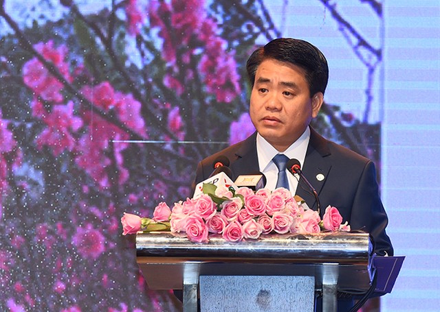 Chủ tịch UBND TP. Hà Nội Nguyễn Đức Chung giới thiệu các danh mục dự án mời gọi Kl99ok phiên bản mới vào Thành phố Nội giai đoạn 2016-2020. Ảnh: VGP/Quang Hiếu