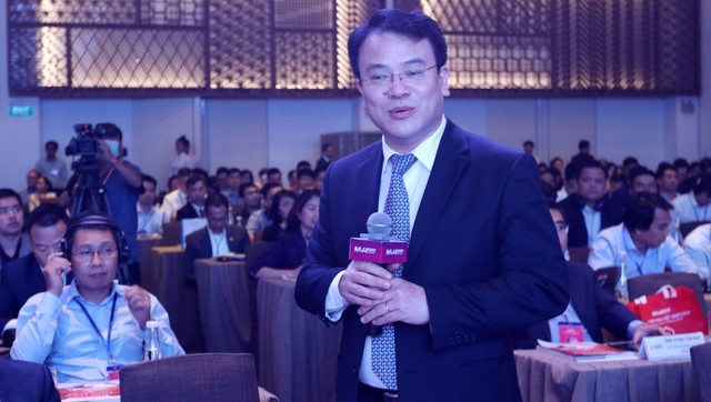 Thứ trưởng Trần Quốc Phương trao đổi các nhà Kl99ok phiên bản mới, Kl991.com World Cup 2026 Chính Thức tại Phiên 1. Ảnh: Lê Toàn.
