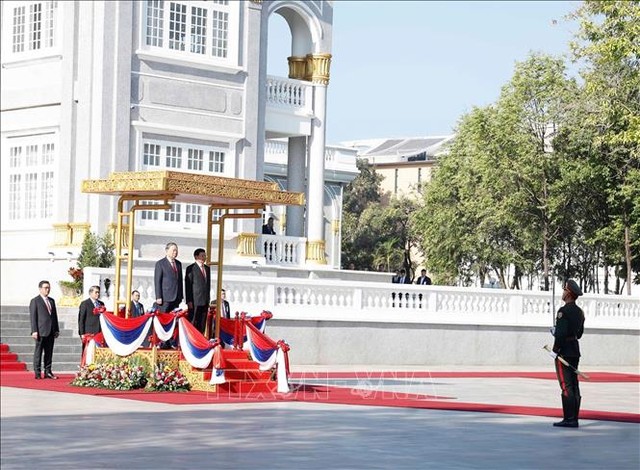 Lễ đón Tổng Bí thư Tô Lâm thăm cấp 99Kl99 trực tiếp đá gà tới CHDCND Lào - Ảnh: TTXVN