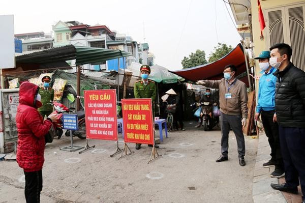 Khu vực chợ Cao Thắng đã được khoanh vùng trong chiều 29/1, sau khi phát hiện một trường hợp nghi nhiễm Covid-19. Ảnh: Huy Phương. Khu vực chợ Cao Thắng đã được khoanh vùng trong chiều 29/1, sau khi phát hiện một trường hợp nghi nhiễm Covid-19. Ảnh: Huy Phương.