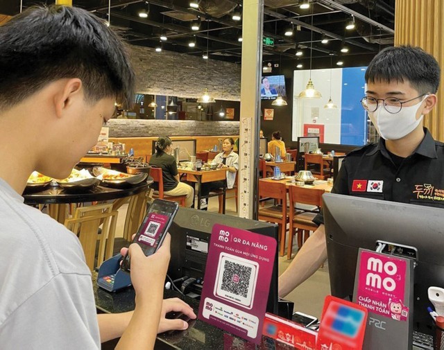MoMo hướng đến phục vụ đa số người dân bình thường, hộ Kl992 VIP Trang Chủ 2026 nhỏ, tiểu thương...
