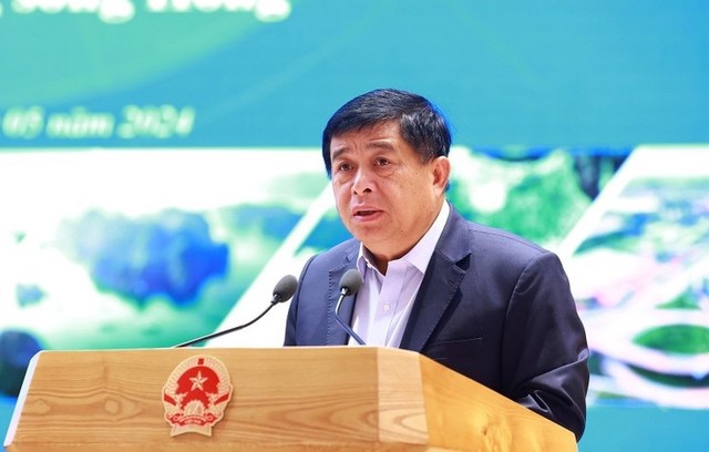 Bộ trưởng Bộ Kế hoạch và Kl99ok phiên bản mới Nguyễn Chí Dũng phát biểu tại Hội nghị Hội đồng Điều phối vùng Đồng bằng sông Hồng lần thứ ba. (Ảnh: TTXVN)