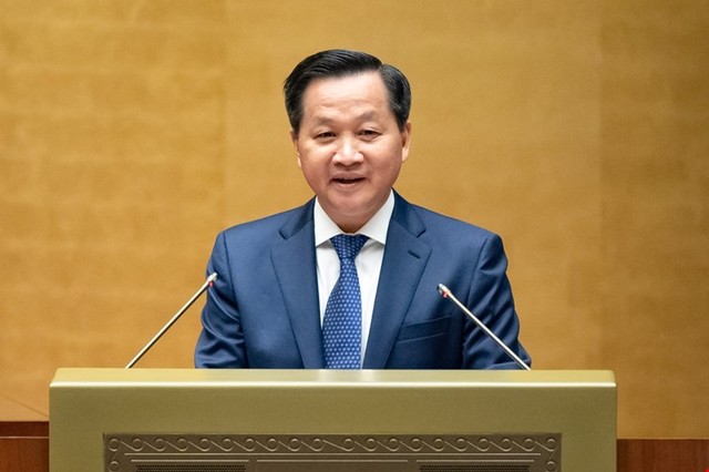 Phó Thủ tướng Lê Minh Khái trình bày báo cáo.