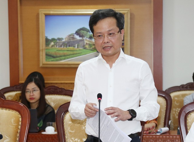 Ông Vũ Hoàng Nam - Phó cục trưởng Cục Quản lý nợ và Kl992 cổng game cá cược đối ngoại (Bộ Kl991.com nạp rút nhanh) báo cáo tại hội nghị. Ảnh: Đức Minh.