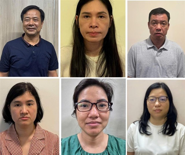 Vợ chồng Nghiêm Quốc Hưng, Phạm Thị Hạnh (Kế toán trưởng Công ty Cung ứng nhân lực Hoàng Long) và một số bị can. Ảnh: BCA