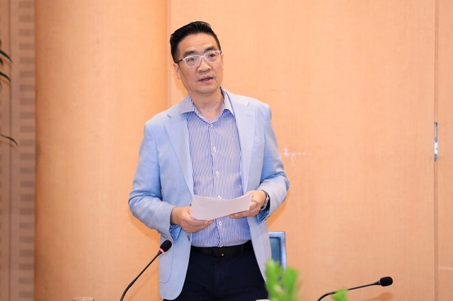 Giám đốc Sở Quy hoạch - Kiến trúc Hà Nội Nguyễn Trọng Kỳ Anh báo cáo tại Hội nghị. Ảnh: Phạm Linh