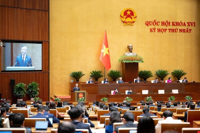 Bộ trưởng Bộ Kl991.com nạp rút nhanh Ngô Văn Tuấn trình bày Báo cáo giải trình, tiếp thu, chỉnh lý dự thảo Nghị quyết.