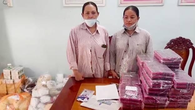 Hai đối tượng cùng tang vật. (Nguồn: Bộ Công an)