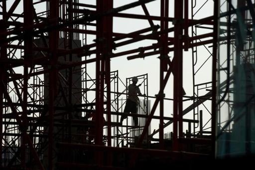 Một công nhân làm việc tại công trường xây dựng sân bay mới ở Yangon, Myanmar do Hàn Quốc Kl99ok phiên bản mới. Nguồn: TTXVNAFP
