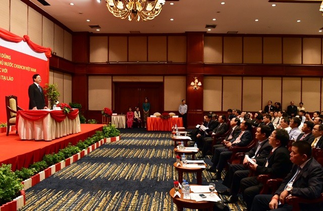 Trưa 14/9, tại thủ đô Vientiane, Thủ tướng Nguyễn Tấn Dũng gặp mặt các nhà Kl99ok phiên bản mới Việt Nam tại Lào - Ảnh: VGP/Nhật Bắc