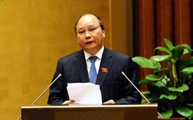 Phó thủ tướng Nguyễn Xuân Phúc thay mặt Kl993 ưu đãi thưởng hấp dẫn đã trình bày Báo cáo tổng hợp việc thực hiện các nghị quyết của Quốc hội