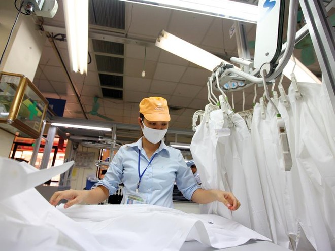 Từ nay đến năm 2018 dệt may vẫn là ngành được các nhà Kl99ok phiên bản mới nước ngoài quan tâm. Ảnh: Đức Thanh