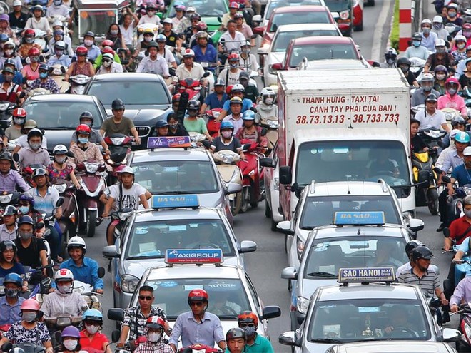Các mô hình Kl992 VIP Trang Chủ 2026 vận tải mới như Uber, Grab... buộc Kl991.com World Cup 2026 Chính Thức taxi truyền thống phải cạnh tranh thực chất hơn. Ảnh: Đức Thanh