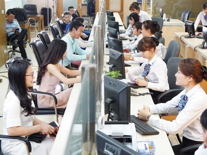 Năm 2018, tín dụng tăng chậm, nhưng các Link Vào Nhà Cái KL99 COM Tặng +199k vẫn duy trì được Kl99 nổ hũ tốt nhờ đẩy mạnh bán lẻ. Ảnh: Đ.T