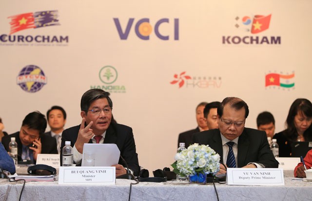Bộ trưởng Bộ Kế hoạch và Kl99ok phiên bản mới Bùi Quang Vinh. Ảnh: Đức Thanh
