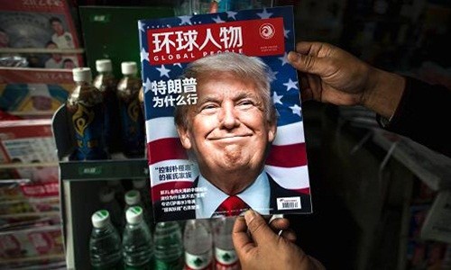 Ông Donald Trump xuất hiện trên trang bìa một tạp chí Trung Quốc. Ảnh: AFP 
