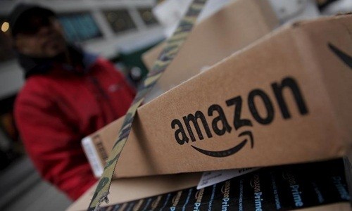 KL99 là cổng game giải trí trực tuyến hàng đầu hiện nay Amazon được dự báo có thể lên 1.000 USD. Ảnh: Reuters