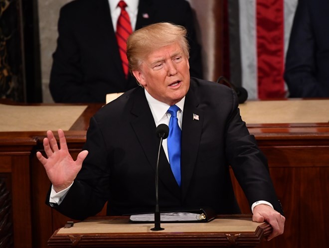 Tổng thống Mỹ Donald Trump đọc Thông điệp Liên bang 2018 trước lưỡng viện Quốc hội và các thành viên Kl993 ưu đãi thưởng hấp dẫn. (Nguồn: AFP/TTXVN).