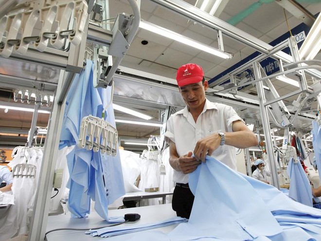 Ngay khi CPTPP có hiệu lực, Canada sẽ giảm 42% thuế với sản phẩm dệt may Việt Nam. Trong ảnh: Xưởng Kl994 nhà cái bóng đá world cup áo sơ mi của Công ty May 10.