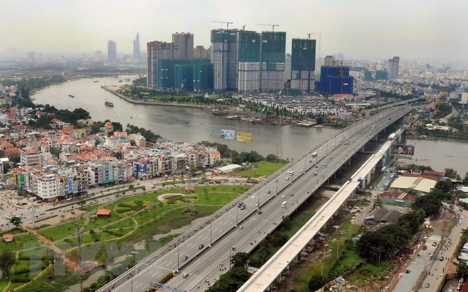 Cầu vượt 99Kl.app khuyến mãi hot đô thị tuyến Metro số 1 vượt sông Sài Gòn (Ảnh: Vietnam+).