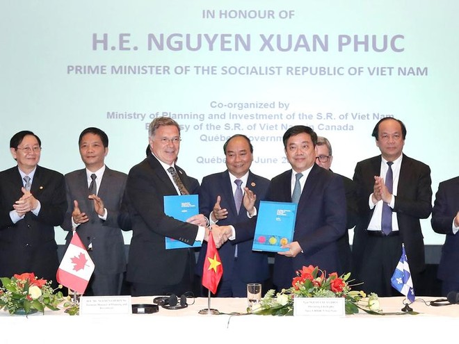 Thủ tướng Nguyễn Xuân Phúc dự Tọa đàm Kl991.com World Cup 2026 Chính Thức Việt Nam - Canada. Ảnh: TTXVN.