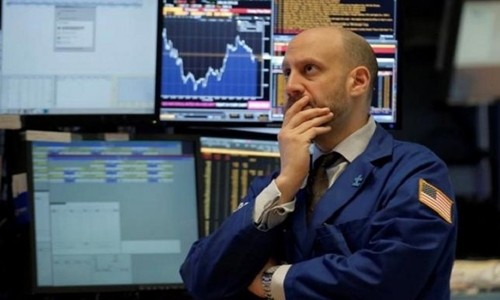 Nhân viên giao dịch trên sàn 99Kl99 link đăng nhập New York. Ảnh: Reuters.