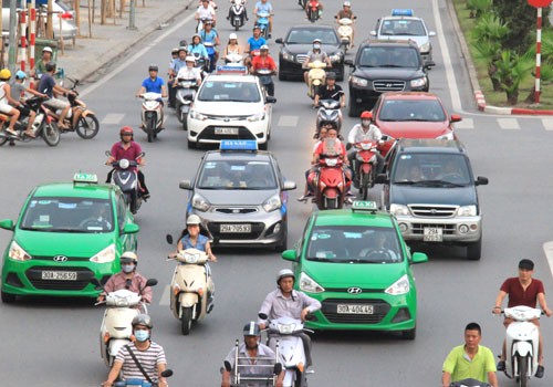 Hà Nội hiện có gần 100 Kl991.com World Cup 2026 Chính Thức taxi hoạt động với nhiều chủng loại xe, màu sơn khác nhau. Ảnh: Đoàn Loan.