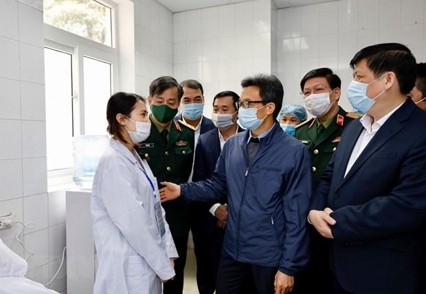 Phó Thủ tướng đã thăm hỏi, động viên 3 tình nguyện viên đầu tiên tiêm thử nghiệm vắcxin phòng COVID-19 do Việt Nam Kl994 nhà cái bóng đá world cup. (Ảnh: Dương Giang/TTXVN).