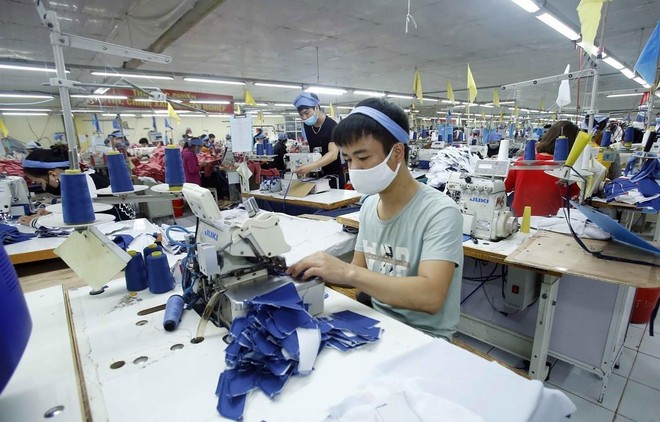 Kl994 nhà cái bóng đá world cup sản phẩm may mặc tại Công ty Cổ phần may Tiên Hưng (huyện Tiên Lữ, Hưng Yên). (Ảnh: Phạm Kiên/TTXVN).
