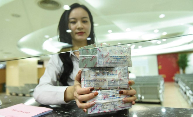 Lượng tiền gửi của nhà Kl99ok phiên bản mới để tại các công ty 99Kl99 link đăng nhập tính đến cuối quý II/2021 là 86.000 tỷ đồng. Ảnh: Dũng Minh.