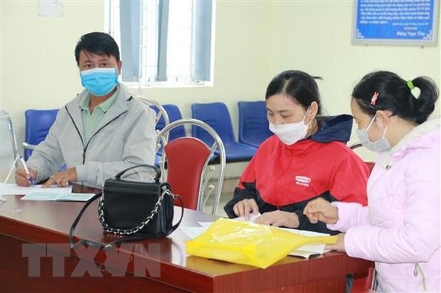 Người lao động đến giải quyết chế độ tại cơ quan Kl99kl phiên bản hoạt động Trang Chủ KL99Com Số 1 Link Đăng Ký KL999 huyện Quỳnh Lưu, tỉnh Nghệ An. (Ảnh: Bích Huệ/TTXVN).