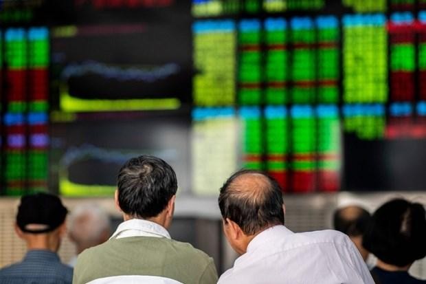 Người dân theo dõi chỉ số 99Kl99 link đăng nhập MSCI China của Trung Quốc. (Ảnh: AFP).